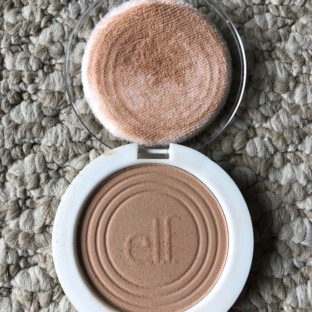 Elf discontinued clarifying pressed powder (light beige)
